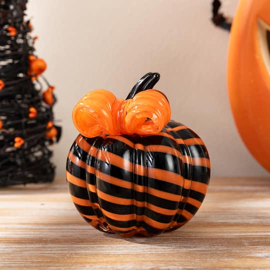 Glitzhome® 4.75" Halloween Striped Glass Pumpkin with Bow